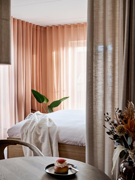 Voodi või voodid majutusasutuse Aura Apartment Hotel toas