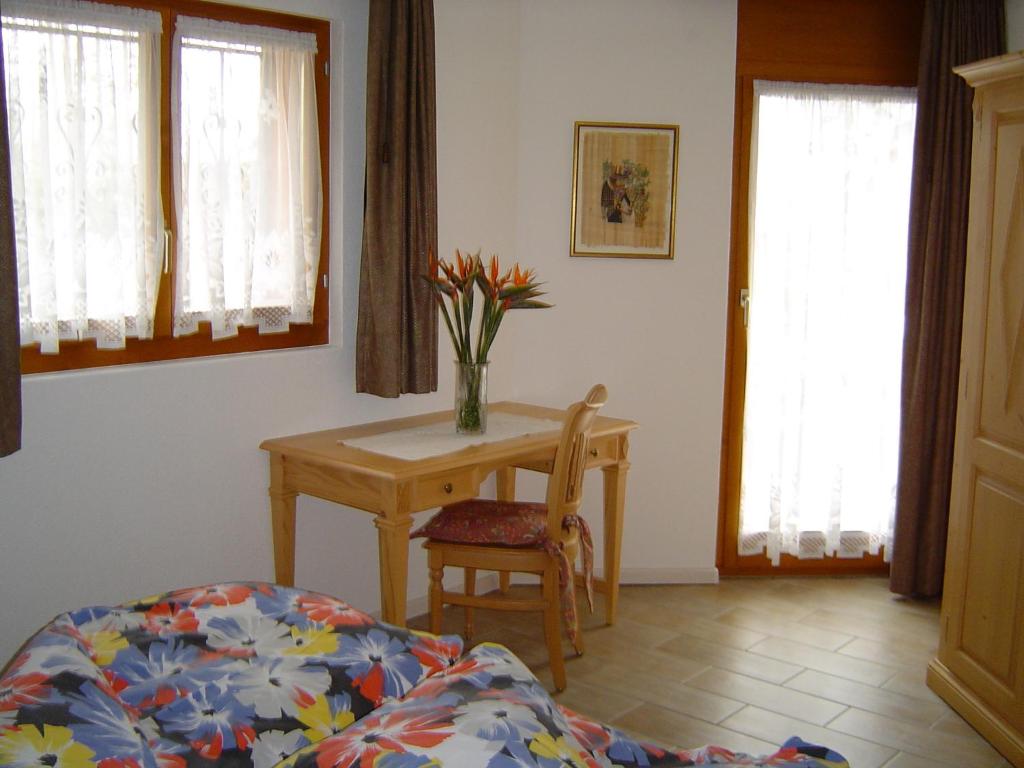 Postel nebo postele na pokoji v ubytování Haus Adora