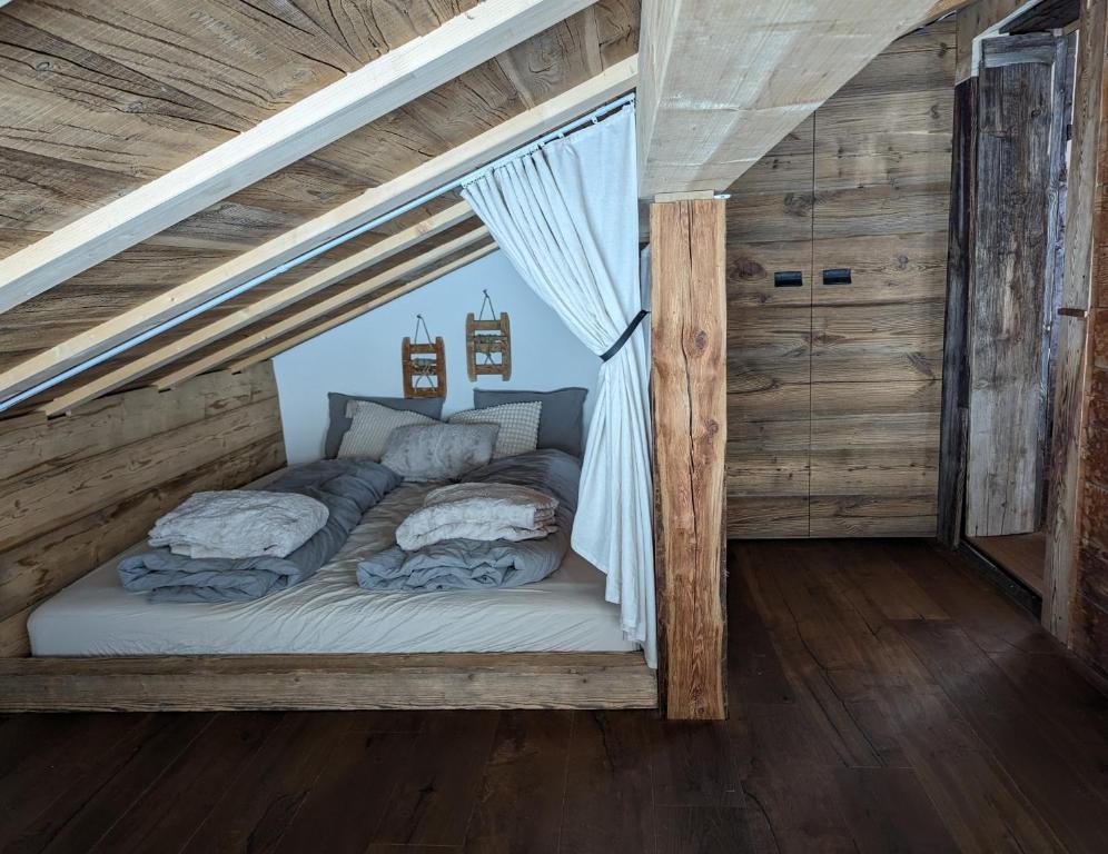 Postel nebo postele na pokoji v ubytování Chalet Adler