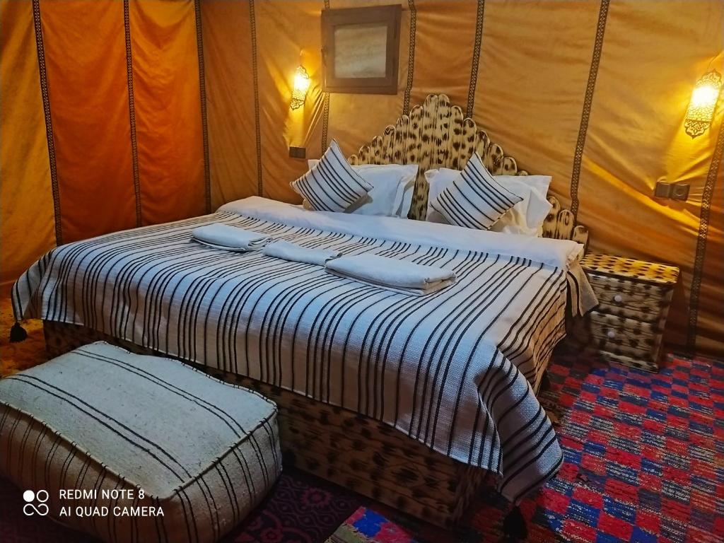 Postel nebo postele na pokoji v ubytování Desert Experience Glamping