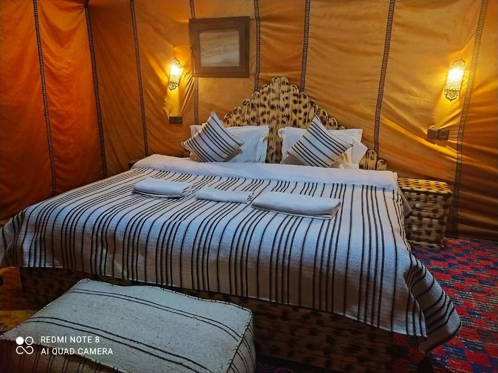 Postel nebo postele na pokoji v ubytování Desert Experience Glamping
