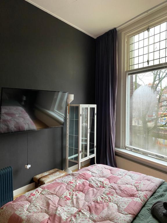 Postel nebo postele na pokoji v ubytování Vintage Rooms Lange Haven