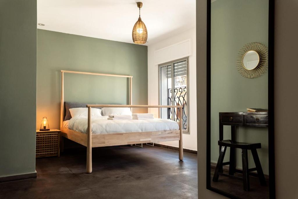 Postel nebo postele na pokoji v ubytování Jaffa Port TLV Hotel Apartments יפו תל אביב