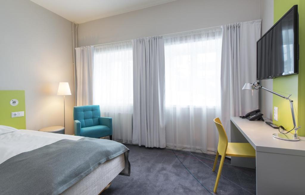 TV a/nebo společenská místnost v ubytování Thon Hotel Trondheim