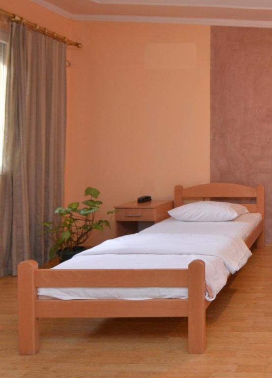 Postel nebo postele na pokoji v ubytování Guest house Vila Bor