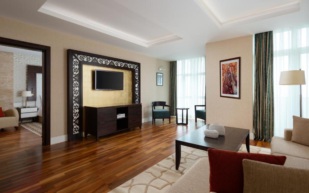 TV a/nebo společenská místnost v ubytování Badamdar Hotel and Residences