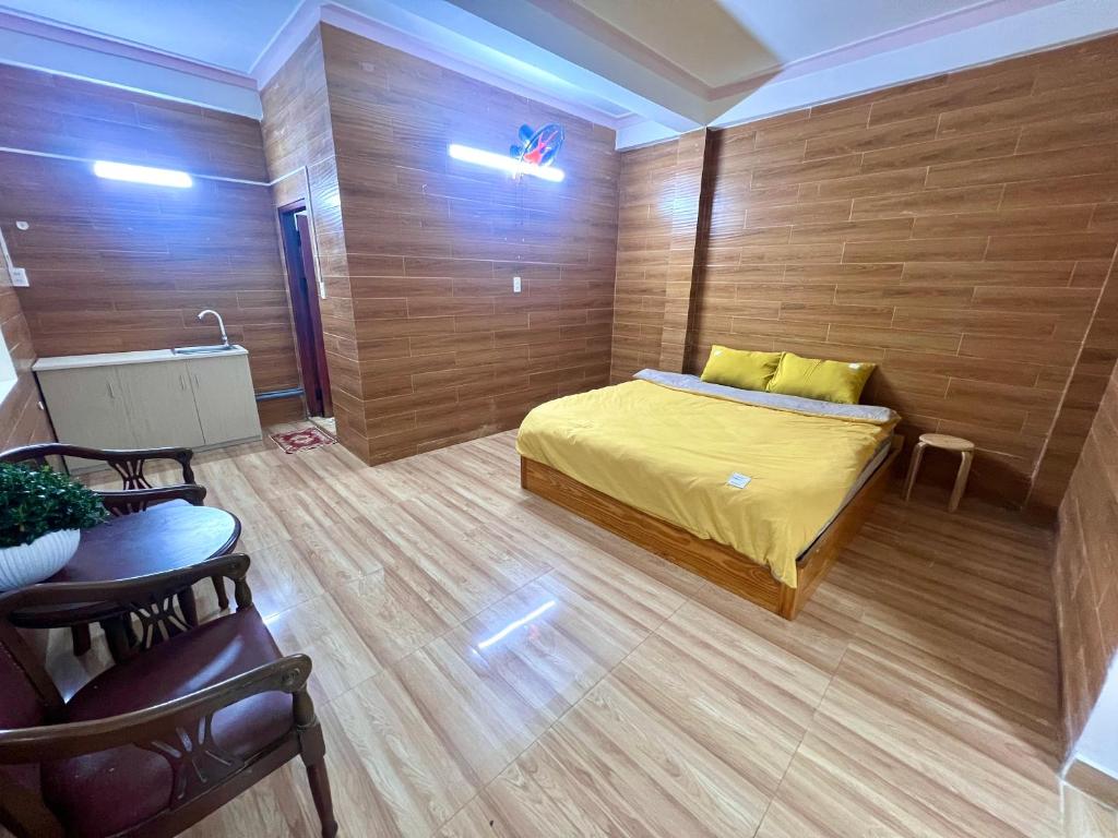 Una cama o camas en una habitación de Nấm Home