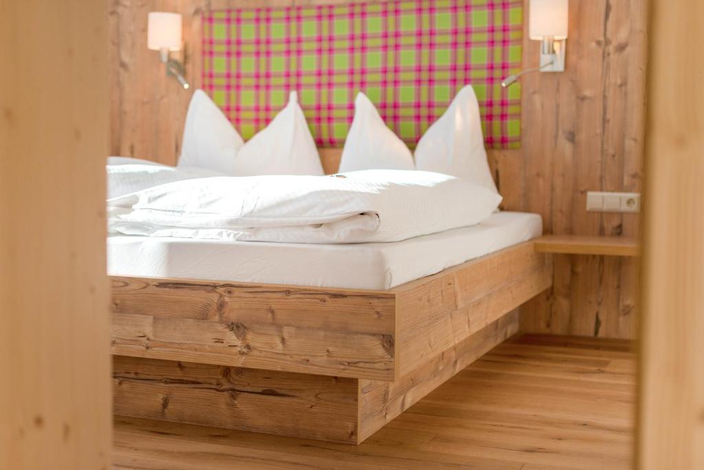 Postel nebo postele na pokoji v ubytování Landhaus Sunseitn