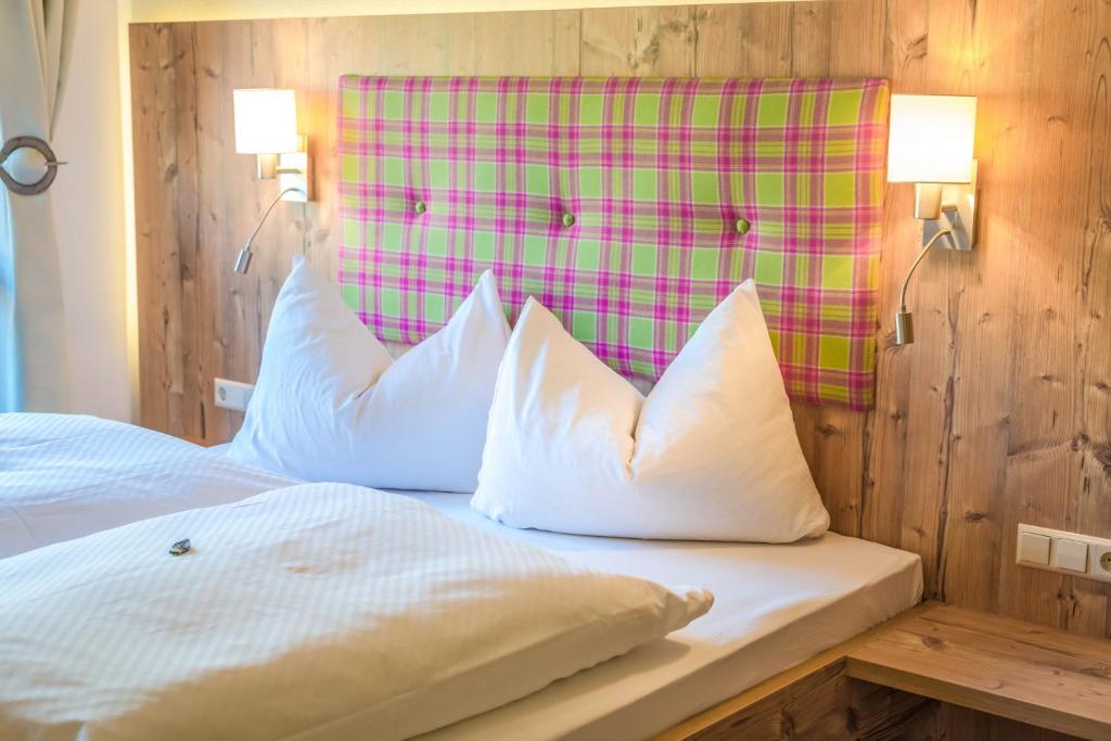 Postel nebo postele na pokoji v ubytování Landhaus Sunseitn