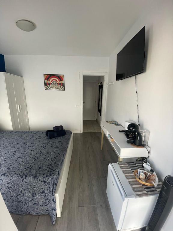 TV a/nebo společenská místnost v ubytování Casa Uma