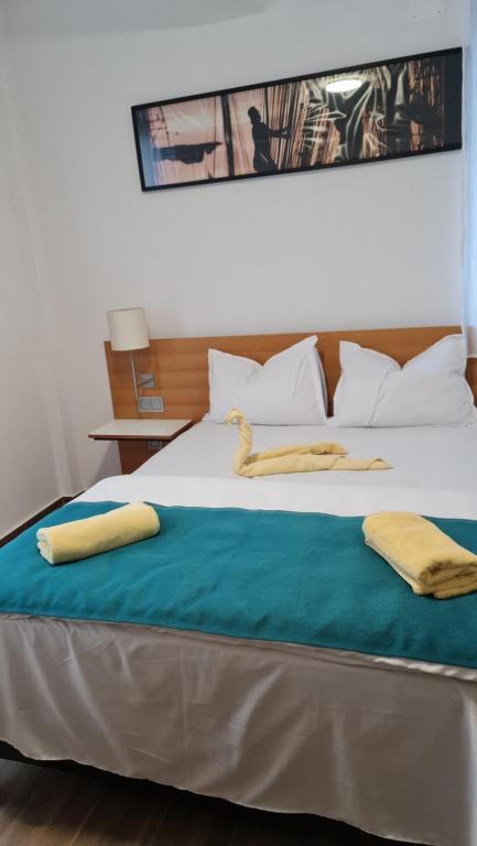 Postel nebo postele na pokoji v ubytování Jafar Resort 7