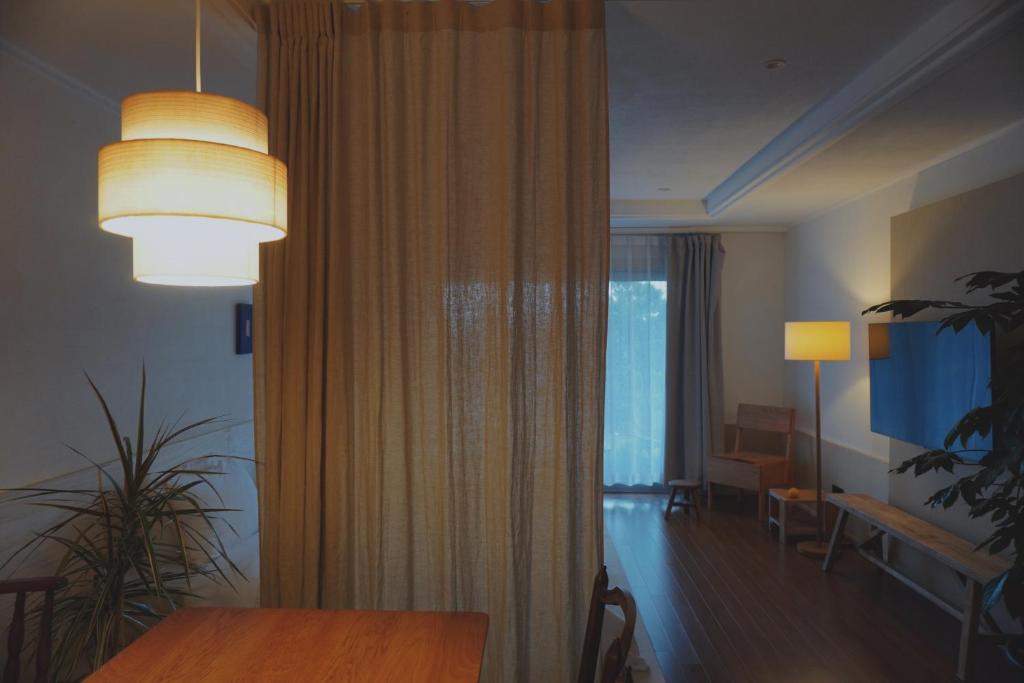 At corner resort & garden - One-Bedroom House