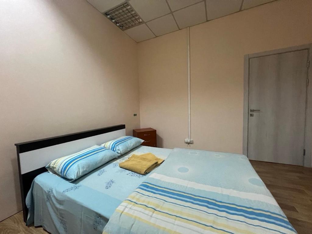 Postel nebo postele na pokoji v ubytování Міні-готель "Старовокзальний"
