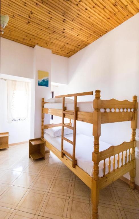 سرير أو أسرّة في غرفة في Vila Toskaj