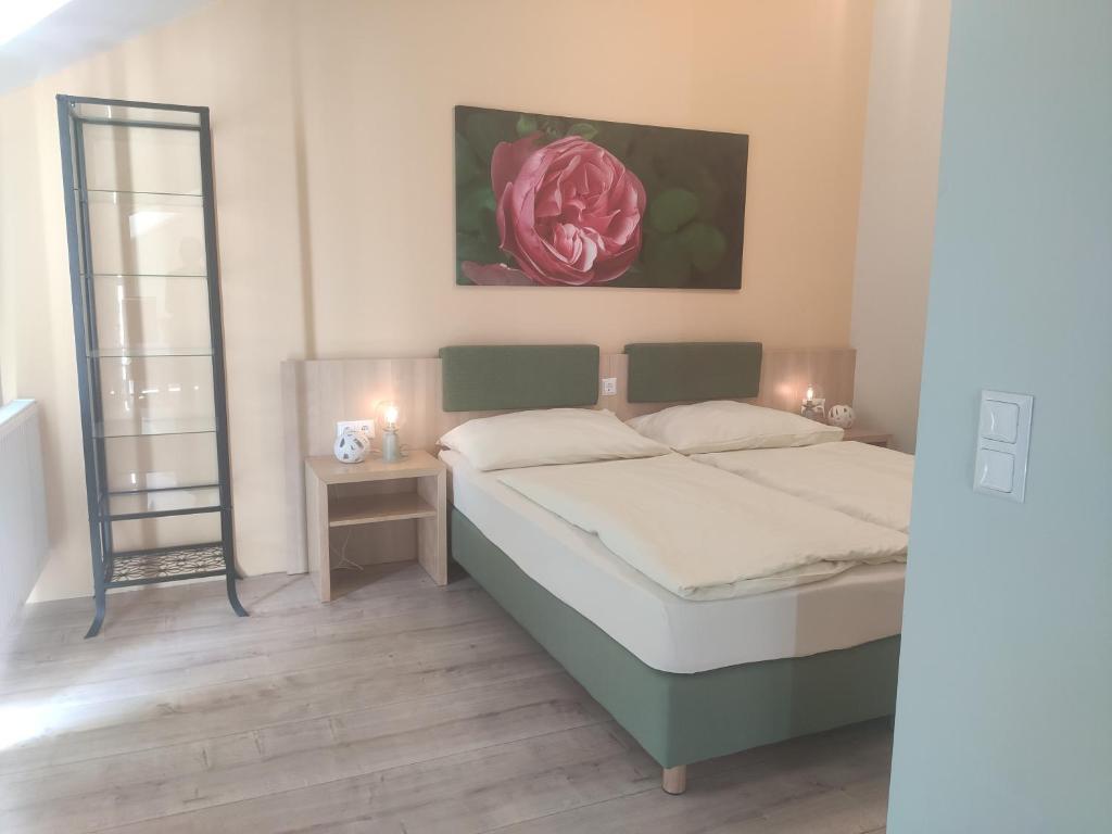 Postel nebo postele na pokoji v ubytování Rosenhotel - Serviced Apartments