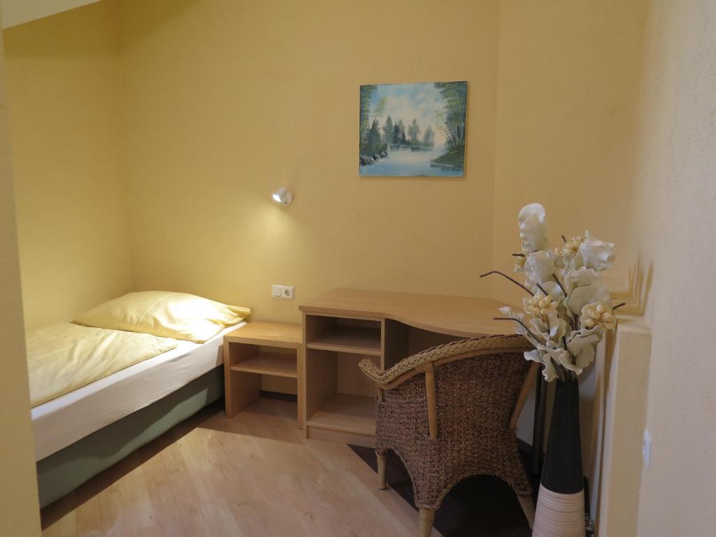 Postel nebo postele na pokoji v ubytování Rosenhotel - Serviced Apartments