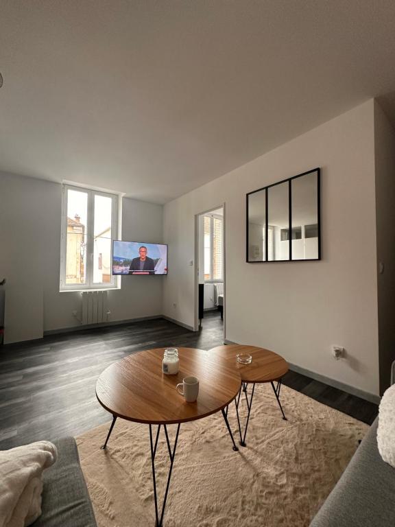 TV a/nebo společenská místnost v ubytování Appart cocooning