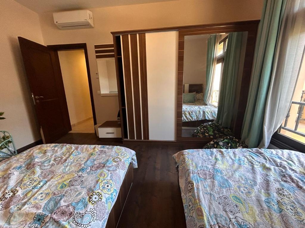 Een bed of bedden in een kamer bij Mivida for rent