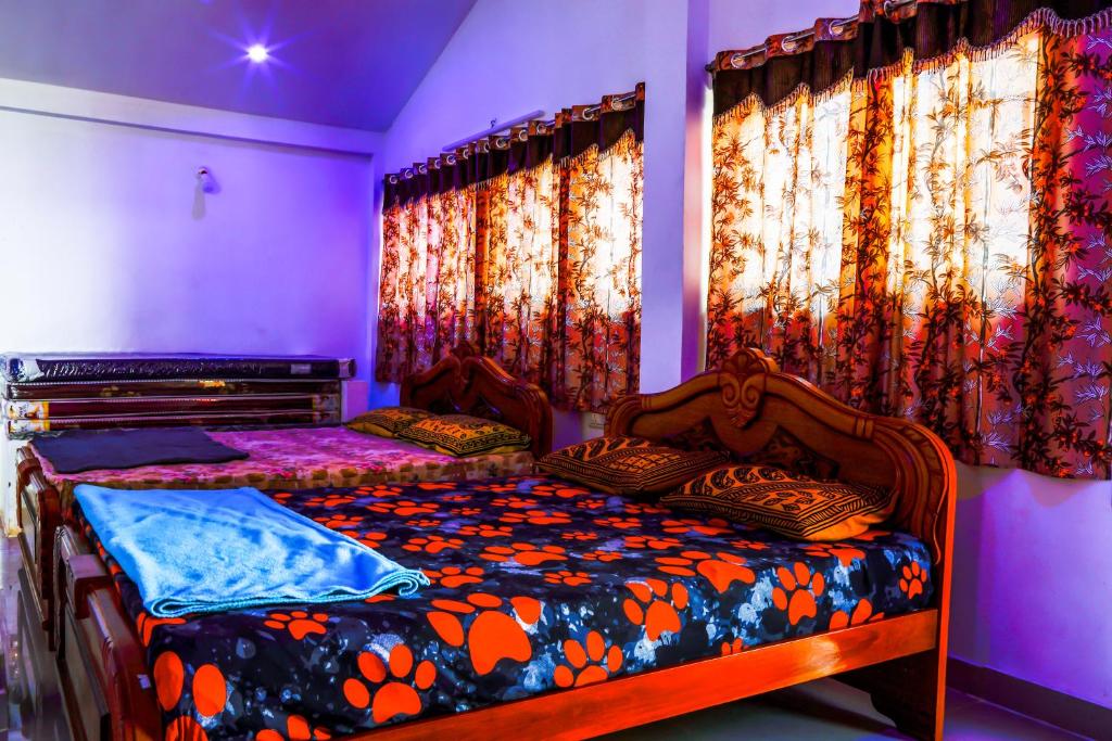 Postel nebo postele na pokoji v ubytování Hotel Five Laurels