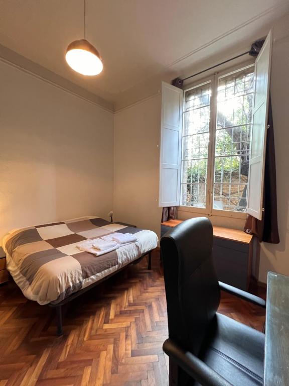 Postel nebo postele na pokoji v ubytování TATA Homes B&B