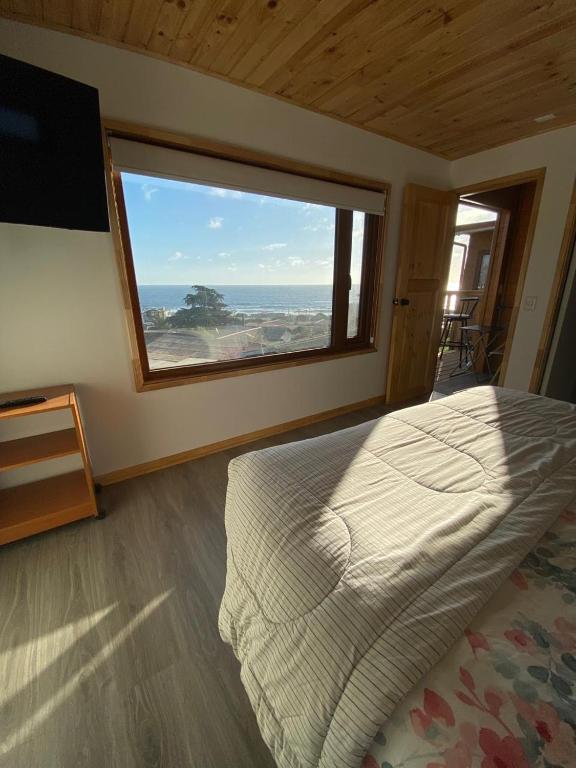 Postel nebo postele na pokoji v ubytování Hostal F