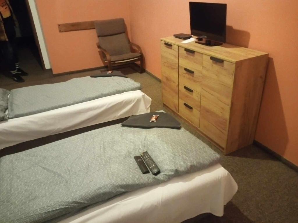 Postel nebo postele na pokoji v ubytování Penzion Prajzko, Hronov