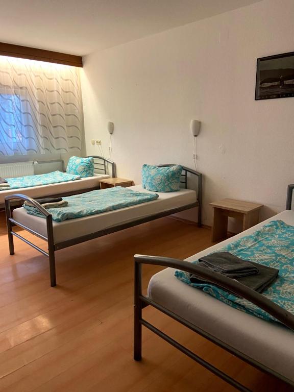 Postel nebo postele na pokoji v ubytování Monteurzimmer - Karlsbad