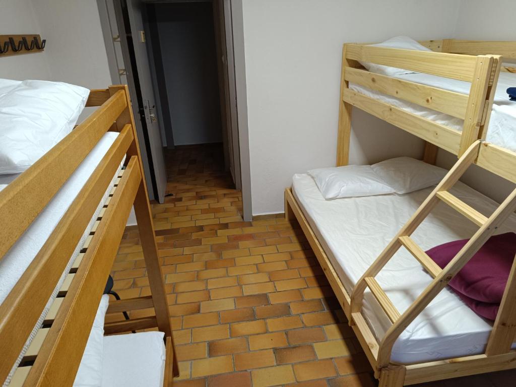 Postel nebo postele na pokoji v ubytování La Mansio de Bons