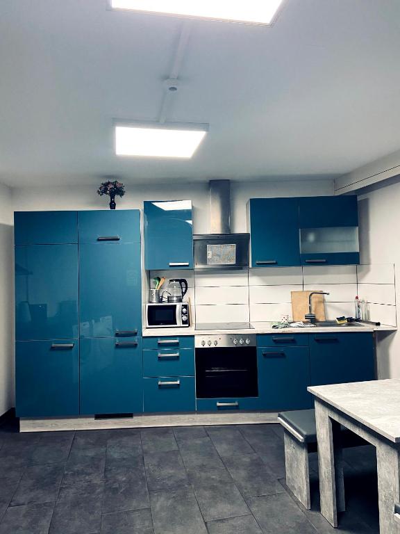 Kuchyň nebo kuchyňský kout v ubytování Monteurzimmer - Karlsbad