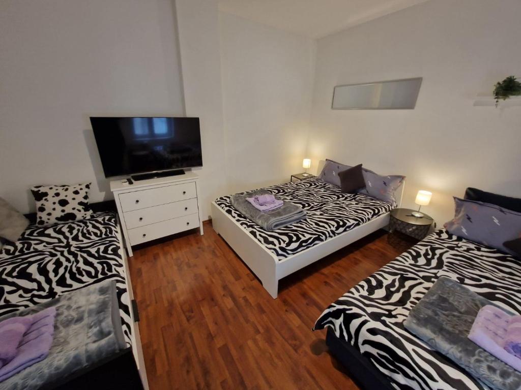 Ένα ή περισσότερα κρεβάτια σε δωμάτιο στο Belgrade Downtown Homestay