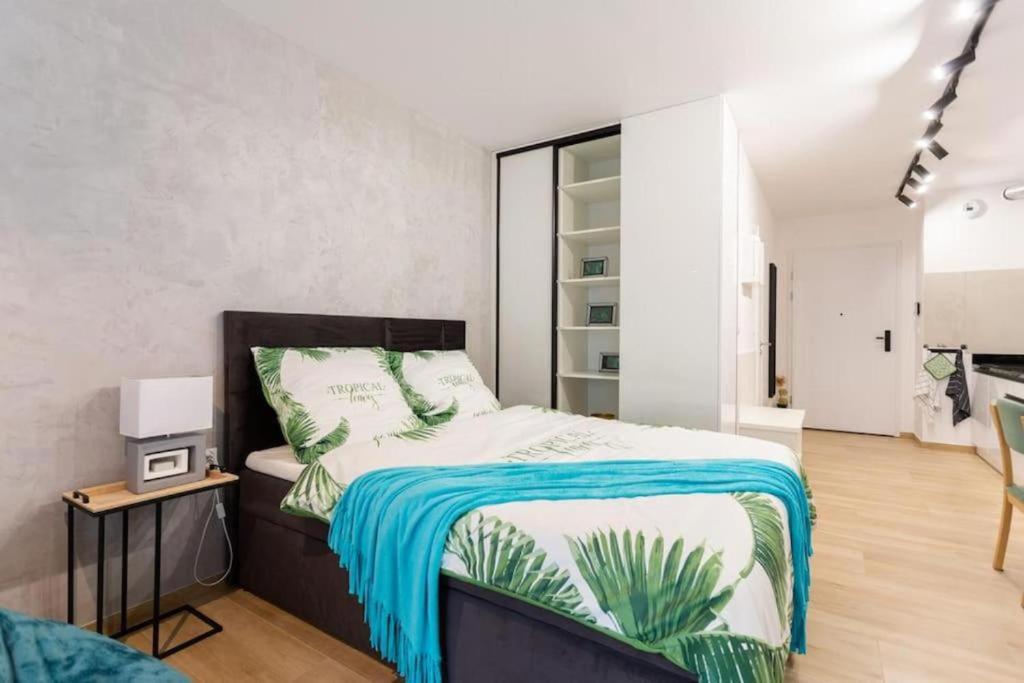 Posteľ alebo postele v izbe v ubytovaní LuxuryCity Apartment with Terrace