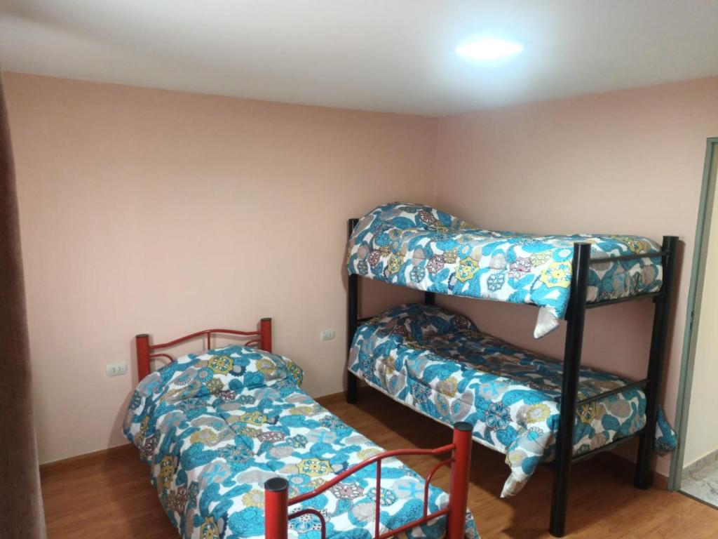 Poschodová posteľ alebo postele v izbe v ubytovaní Lo de fernando 6