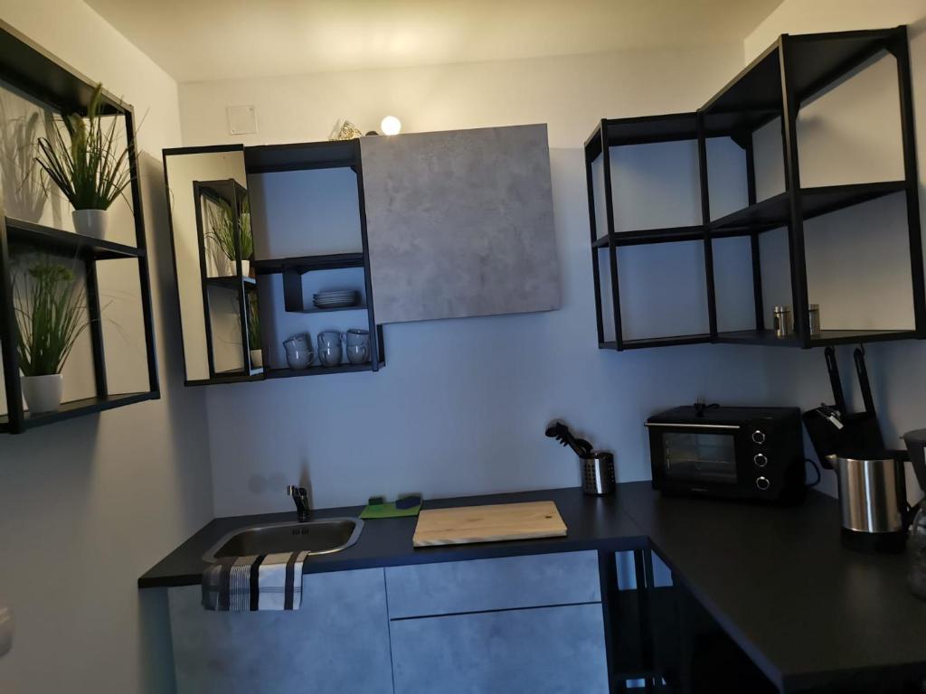 Kuchyň nebo kuchyňský kout v ubytování Monteurzimmer - Karlsbad