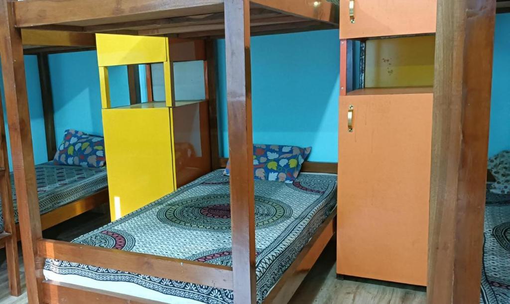 Postel nebo postele na pokoji v ubytování Himalayas Youth Hostel Kempty Mussoorie