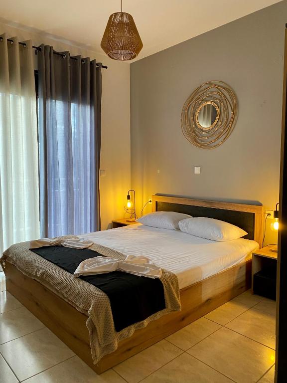 Posteľ alebo postele v izbe v ubytovaní Maya Suites Kallithea