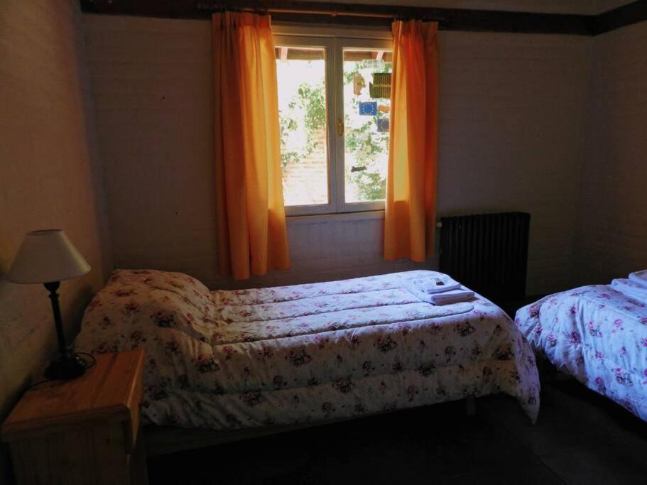 Postel nebo postele na pokoji v ubytování El Sauce - Trevelin.