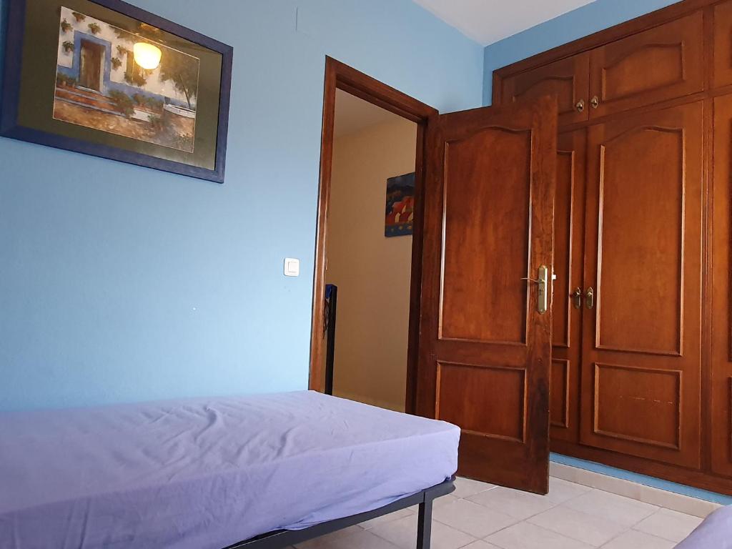 Postel nebo postele na pokoji v ubytování Townhouse in Las Rotas