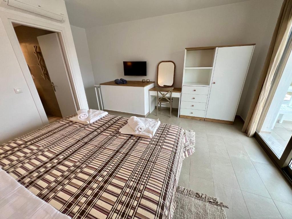 Postel nebo postele na pokoji v ubytování Garden Residence