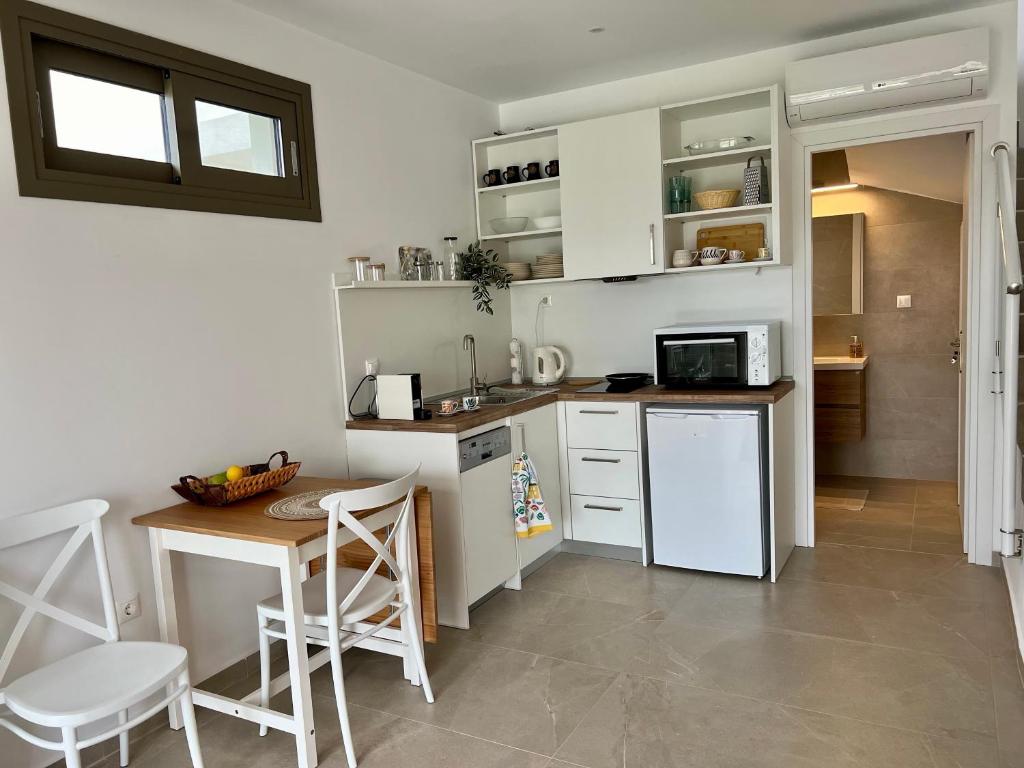 Kuchyň nebo kuchyňský kout v ubytování Garden Residence