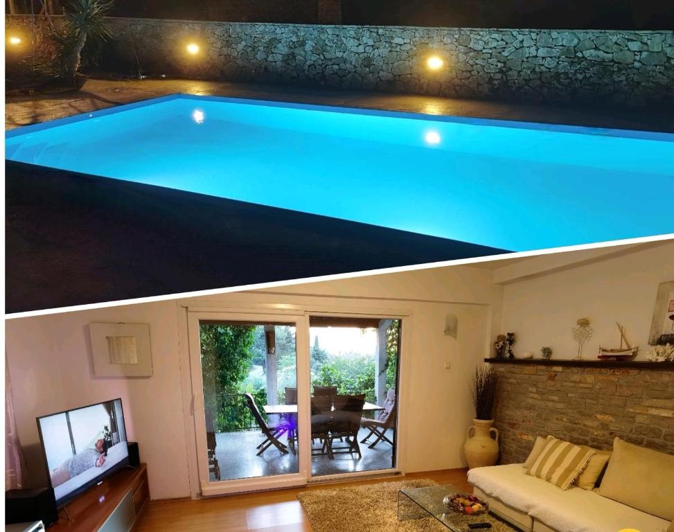 a swimming pool in a living room and a house at Jees Exclusive Apartments Hvar in Stari Grad