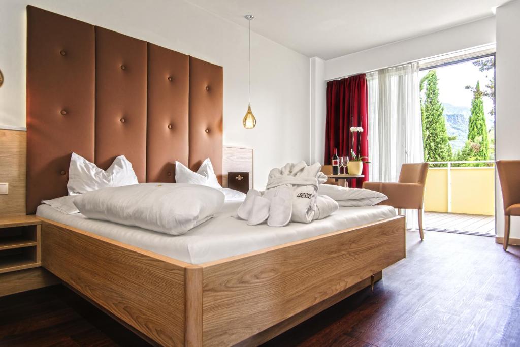 Postel nebo postele na pokoji v ubytování Hotel Anatol