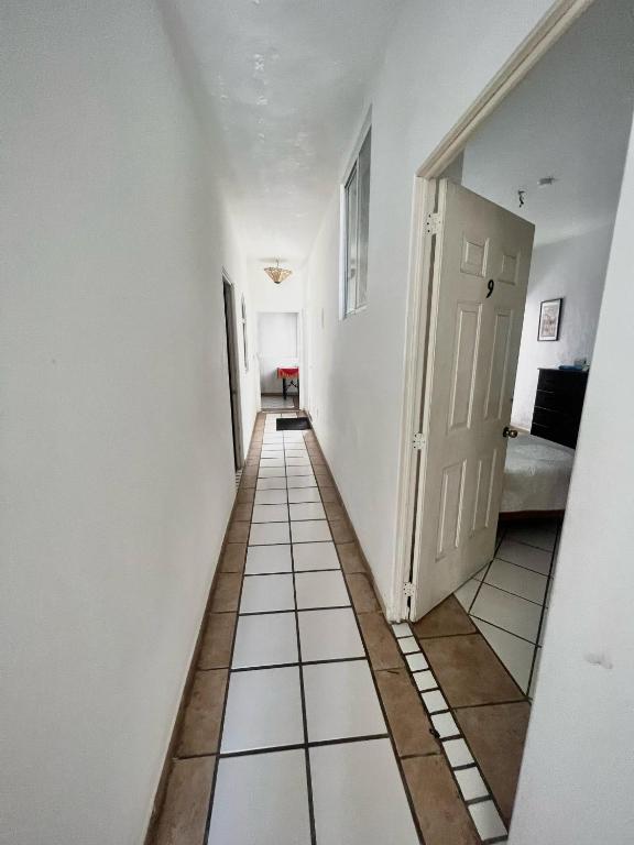 Postel nebo postele na pokoji v ubytování Alexandross