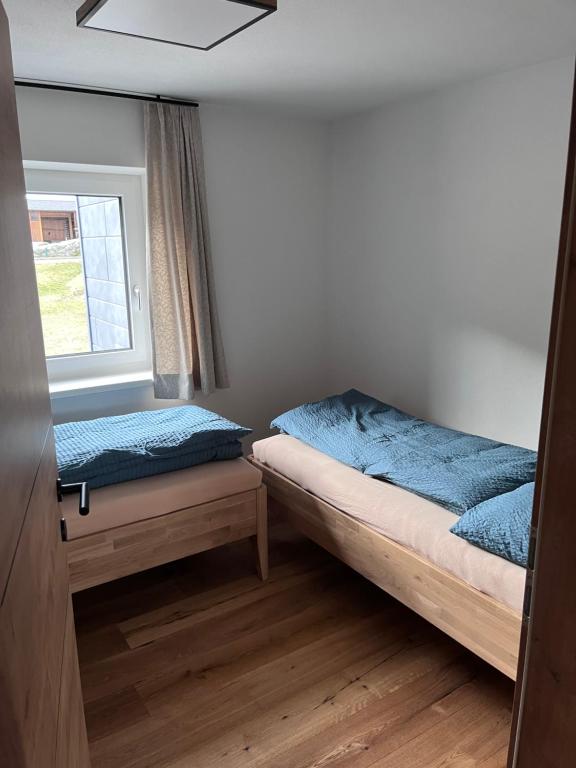 Postel nebo postele na pokoji v ubytování Apartment Tanzberger