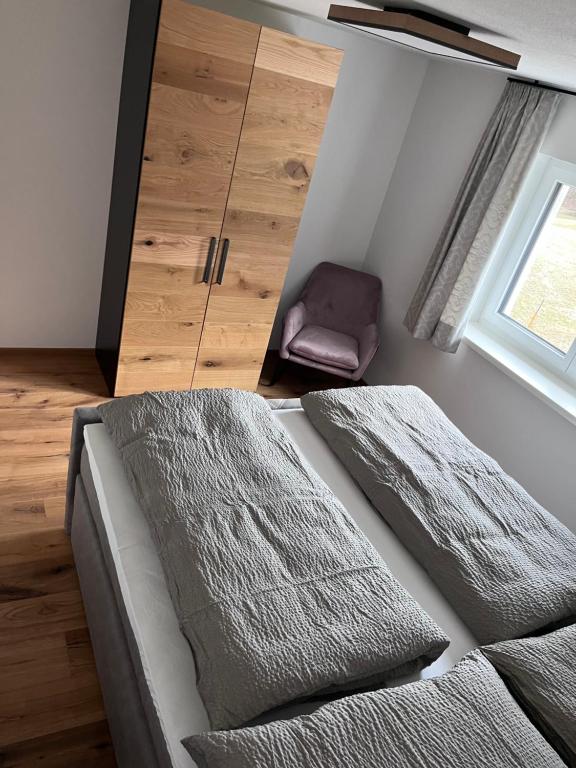 Postel nebo postele na pokoji v ubytování Apartment Tanzberger