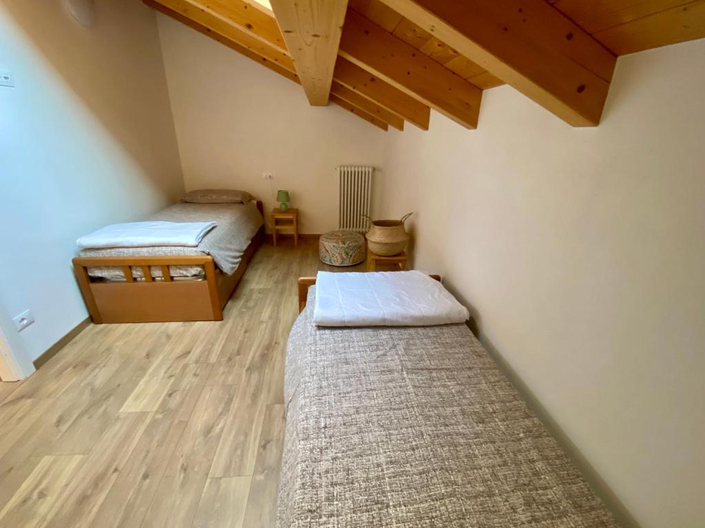 Postel nebo postele na pokoji v ubytování Casa Zoe