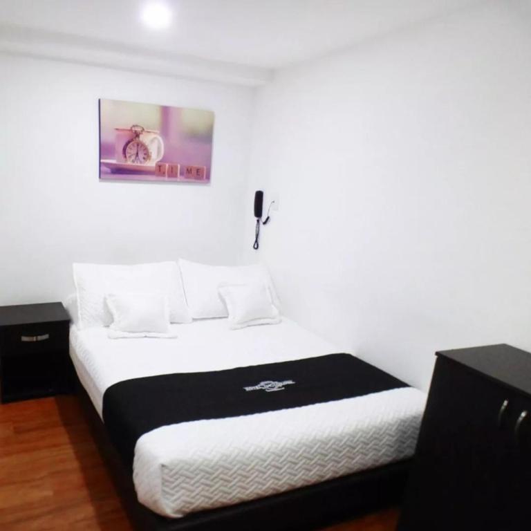 Postel nebo postele na pokoji v ubytování Hotel Colonial Internacional