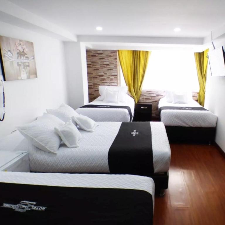 Postel nebo postele na pokoji v ubytování Hotel Colonial Internacional