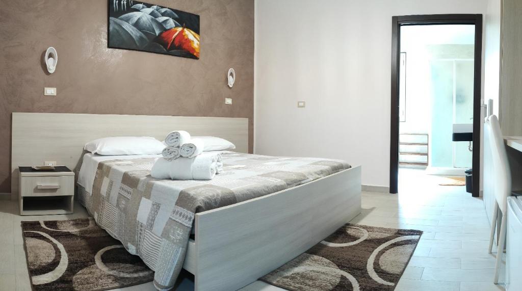 Postel nebo postele na pokoji v ubytování Guest House Elettra