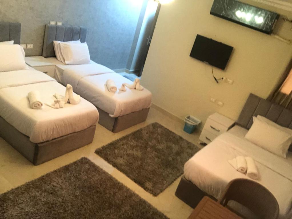 Postel nebo postele na pokoji v ubytování THE GEM VIEW BOUTIQUE