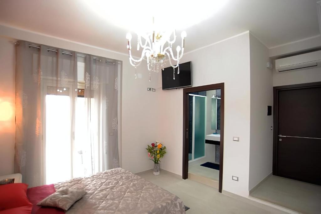 Postel nebo postele na pokoji v ubytování Guest House Elettra